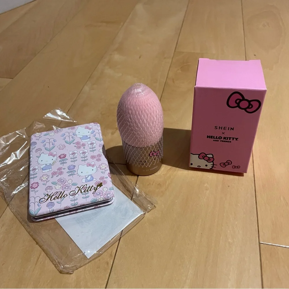 New hello kitty compact and mini brush set